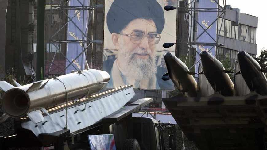 EDITORS' NOTE: Reuters and other foreign media are subject to Iranian restrictions on their ability to film or take pictures in Tehran.
Iranian-made Fateh 110 (Conqueror) (L) and Persian Gulf (R) missiles are seen next to a portrait of Iran's Supreme Leader Ayatollah Ali Khamenei at a war exhibition held by Iran's revolutionary guard to mark the anniversary of the Iran-Iraq war (1980-88), also known in Iran as the "Holy Defence", at Baharestan square near the Iranian Parliament in southern Tehran September 