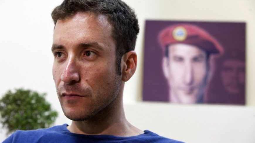 Itzik Shmuli, head of the National Student Union and one of the leaders of Israel's social protest movement, is seen during an interview with Reuters in Tel Aviv August 29, 2011. The protest movement which got off the ground in July when a handful of young Israelis, frustrated with the high price of housing, pitched tents along a major boulevard in Tel Aviv, faces its moment of truth on Saturday when the turnout for a "March of a Million" demonstration in Tel Aviv will show whether a popular push for reform