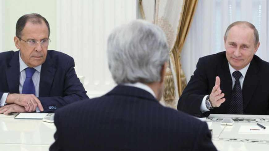 Russia's President Vladimir Putin (R) speaks to U.S. Secretary of State John Kerry (C) as Russia's Foreign Minister Sergei Lavrov listens during their meeting in Moscow, May 7, 2013. Kerry told Putin on Tuesday the United States and Russia share common interests in Syria, including promoting regional stability and preventing the spread of extremism. REUTERS/Mikhail Klimentyev/RIA Novosti/Pool (RUSSIA - Tags: POLITICS)
ATTENTION EDITORS - THIS IMAGE HAS BEEN SUPPLIED BY A THIRD PARTY. IT IS DISTRIBUTED, E