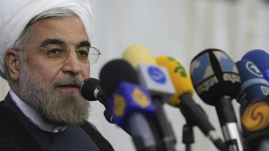 Iranian President-elect Hassan Rohani speaks to the media following a visit to the Khomeini mausoleum in Tehran June 16, 2013. Reuters/Fars News/Seyed Hassan Mousavi   (IRAN - Tags: POLITICS) ATTENTION EDITORS - THIS IMAGE WAS PROVIDED BY A THIRD PARTY. FOR EDITORIAL USE ONLY. NOT FOR SALE FOR MARKETING OR ADVERTISING CAMPAIGNS. THIS PICTURE IS DISTRIBUTED EXACTLY AS RECEIVED BY REUTERS, AS A SERVICE TO CLIENTS - RTX10Q4G
