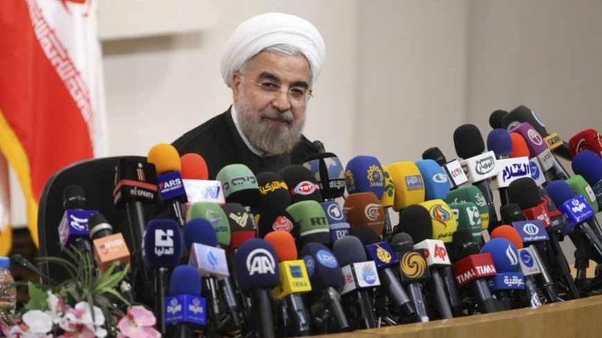 Iranian President-elect Hassan Rohani speaks with the media during a news conference in Tehran June 17, 2013. REUTERS/Fars News/Majid Hagdost (IRAN - Tags: POLITICS PROFILE) ATTENTION EDITORS - THIS IMAGE WAS PROVIDED BY A THIRD PARTY. FOR EDITORIAL USE ONLY. NOT FOR SALE FOR MARKETING OR ADVERTISING CAMPAIGNS. THIS PICTURE IS DISTRIBUTED EXACTLY AS RECEIVED BY REUTERS, AS A SERVICE TO CLIENTS - RTX10QWN