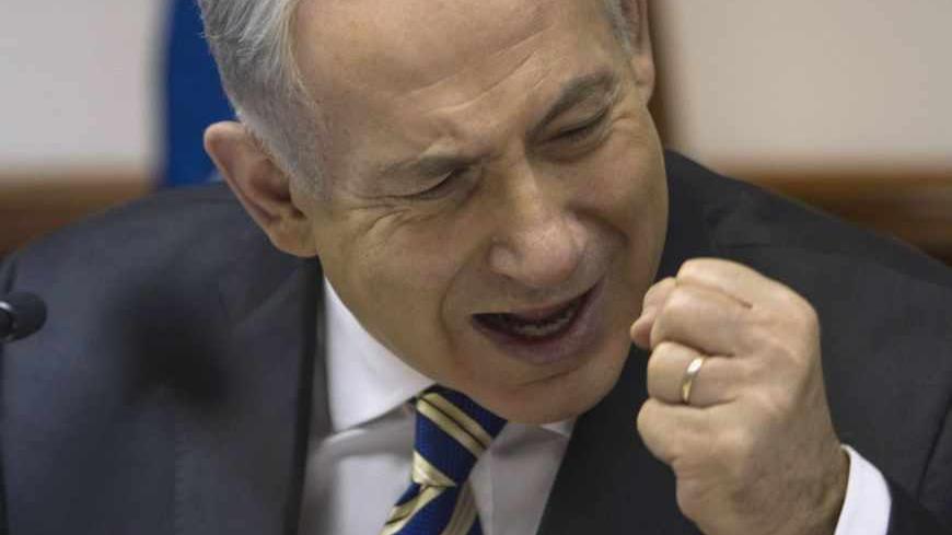 Israel's Prime Minister Benjamin Netanyahu attends the weekly cabinet meeting in Jerusalem June 23, 2013. Netanyahu's cabinet will vote on Sunday on a decision to keep most of Israel's newfound natural gas for domestic use, but to still allow enough exports to satisfy exploration companies seeking access to the global market. REUTER/Baz Ratner (JERUSALEM - Tags: POLITICS BUSINESS ENERGY) - RTX10XWH