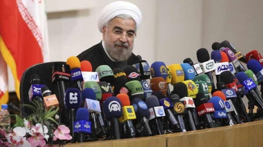 Iranian President-elect Hassan Rohani speaks with the media during a news conference in Tehran June 17, 2013. REUTERS/Fars News/Majid Hagdost (IRAN - Tags: POLITICS PROFILE) ATTENTION EDITORS - THIS IMAGE WAS PROVIDED BY A THIRD PARTY. FOR EDITORIAL USE ONLY. NOT FOR SALE FOR MARKETING OR ADVERTISING CAMPAIGNS. THIS PICTURE IS DISTRIBUTED EXACTLY AS RECEIVED BY REUTERS, AS A SERVICE TO CLIENTS - RTX10QWN