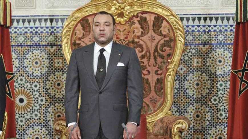 Morocco's King Mohammed (R) prepares to address the nation in Rabat June 17, 2011. Morocco's King Mohammed promised a new democratic constitution on Friday that would devolve some of his powers to parliament and the government, adding Moroccans would be able to vote for the changes in a July 1 referendum.  REUTERS/Maghreb Arab Press/Handout (MOROCCO - Tags: POLITICS ROYALS) FOR EDITORIAL USE ONLY. NOT FOR SALE FOR MARKETING OR ADVERTISING CAMPAIGNS. THIS IMAGE HAS BEEN SUPPLIED BY A THIRD PARTY. IT IS DISTR
