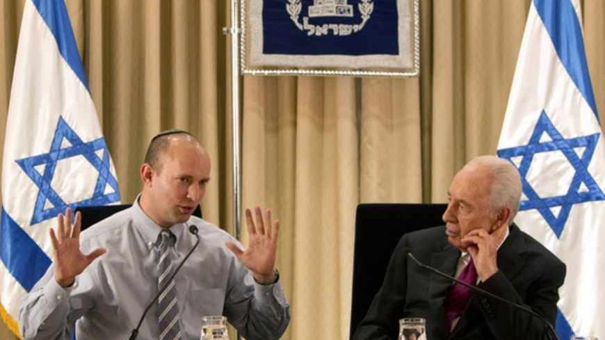 Israel's President Shimon Peres (R) meets head of the Bayit Yehudi party Naftali Bennett at Peres' residence in Jerusalem January 31, 2013. Peres began talks with political parties on Wednesday over who should form a new government and appears certain to ask incumbent Prime Minister Benjamin Netanyahu to assemble it. REUTERS/Sebastian Scheiner/Pool (JERUSALEM - Tags: POLITICS ELECTIONS) - RTR3D6TK