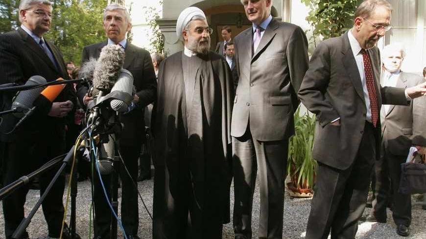 EU ministers and officials and Iran's chief nuclear negotiator give news conference after three hours of talks on Tehran's nuclear plans in Geneva.   German Foreign Minister Joschka Fischer, British Foreign Secretary Jack Straw, Iran's chief nuclear negotiator Hassan Rohani, French Foreign Minister Michel Barnier and EU General Secretary Javier Solana (L-R) give a news conference outside the residence of the Iranian ambassador to the U.N. in Geneva, May 25, 2005 after three hours of talks on Tehran's nuclea