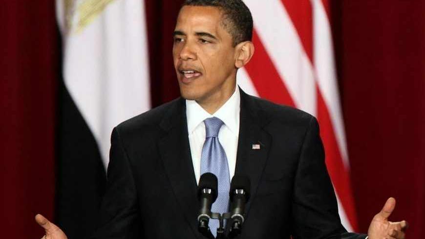 U.S. President Barack Obama delivers a speech in the Grand Hall of Cairo University June 4, 2009. Obama sought a "new beginning" between the United States and the Muslim world on Thursday but offered no new initiative to end the Palestinian-Israeli conflict, an omission likely to disappoint many.  REUTERS/Goran Tomasevic   (EGYPT POLITICS RELIGION) - RTR249M5