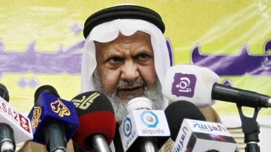 Jordan's Muslim Brotherhood leader Hammam Saed (R) speaks during a news conference with the Jordan's Islamic Action Front Party (IAF) in Amman March 26, 2011. The IAF called for the resignation of Jordan's Prime Minister Marouf al-Bakhit and to resolve the Gendarmerie, after the violence that took place on Friday during the sit-in protest organized by a group calling themselves the "Youth of March 24 Movement". REUTERS/Muhammad Hamed (JORDAN - Tags: POLITICS CIVIL UNREST) - RTR2KFM2