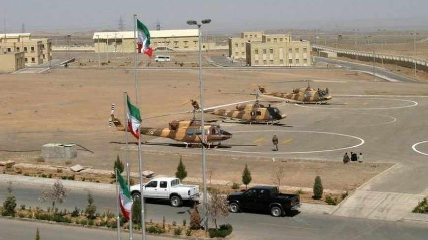 A general view of the Natanz uranium enrichment facility, 250 km (150 miles) south of Tehran, March 30, 2005. Iranian President Mohammad Khatami Khatami took a group of journalists deep underground on Wednesday into the heart of the nuclear plant which Washington wants dismantled and whose existence was kept secret until 2002. REUTERS/Raheb Homavandi  RH/CN - RTR6JAI