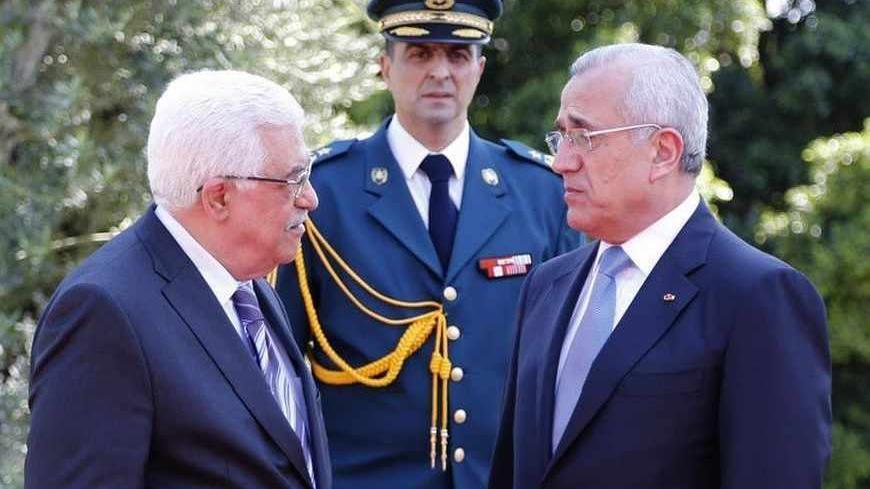 Lebanon's President Michel Suleiman (R) meets with Palestinian President Mahmoud Abbas at the presidential palace in Baabda, near Beirut July 3, 2013. REUTERS/Dalati Nohra/Handout via Reuters (LEBANON - Tags: POLITICS) ATTENTION EDITORS - THIS IMAGE WAS PROVIDED BY A THIRD PARTY. FOR EDITORIAL USE ONLY. NOT FOR SALE FOR MARKETING OR ADVERTISING CAMPAIGNS. THIS PICTURE IS DISTRIBUTED EXACTLY AS RECEIVED BY REUTERS, AS A SERVICE TO CLIENTS - RTX11BAD