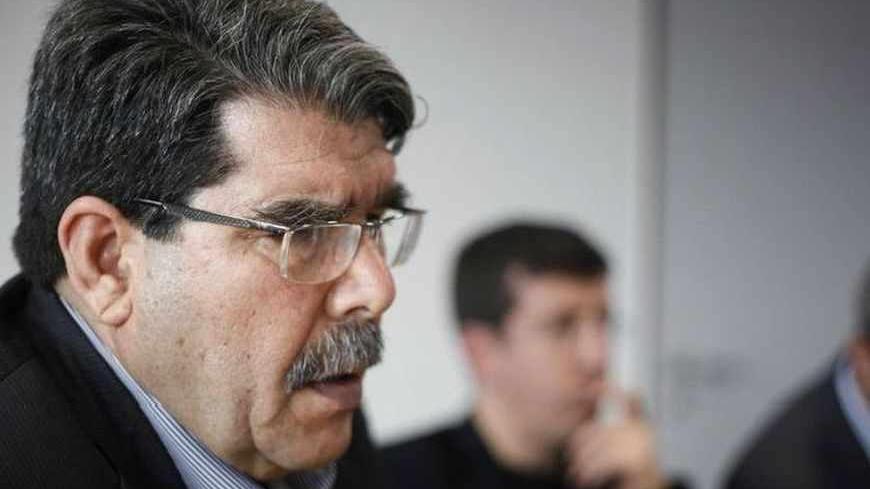 Saleh Muslim, head of the Kurdish Democratic Union Party (PYD), is seen during a Reuters interview in Berlin April 18, 2013.  Bombings of Kurdish areas in Syria suggest that Syrian Kurds, long detached from the revolt against President Bashar al-Assad, are increasingly being targeted by his forces after they struck deals with rebels fighting to topple him, Muslim said. To match Interview SYRIA-CRISIS/KURDS REUTERS/Wolfgang Rattay (GERMANY - Tags: POLITICS CIVIL UNREST PROFILE) - RTXYR77