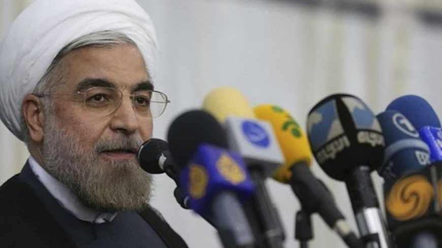 Iranian President-elect Hassan Rohani speaks to the media following a visit to the Khomeini mausoleum in Tehran June 16, 2013. Reuters/Fars News/Seyed Hassan Mousavi   (IRAN - Tags: POLITICS) ATTENTION EDITORS - THIS IMAGE WAS PROVIDED BY A THIRD PARTY. FOR EDITORIAL USE ONLY. NOT FOR SALE FOR MARKETING OR ADVERTISING CAMPAIGNS. THIS PICTURE IS DISTRIBUTED EXACTLY AS RECEIVED BY REUTERS, AS A SERVICE TO CLIENTS - RTX10Q4G