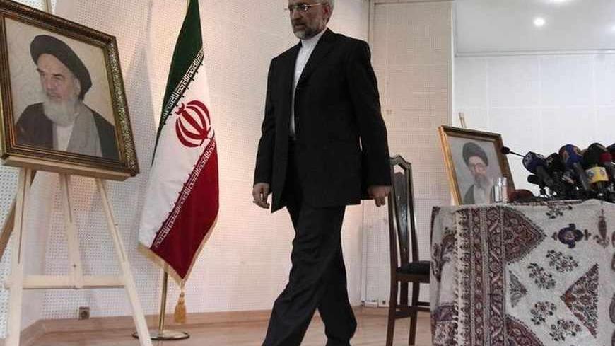 Iran's chief negotiator Saeed Jalili leaves after his news conference at the Iranian Consulate in Istanbul May 16, 2013. Iran is prepared to pursue nuclear diplomacy with world powers before or after next month's presidential election in the Islamic Republic, its chief negotiator said on Thursday.  REUTERS/Osman Orsal (TURKEY - Tags: POLITICS) ENERGY) - RTXZOPV