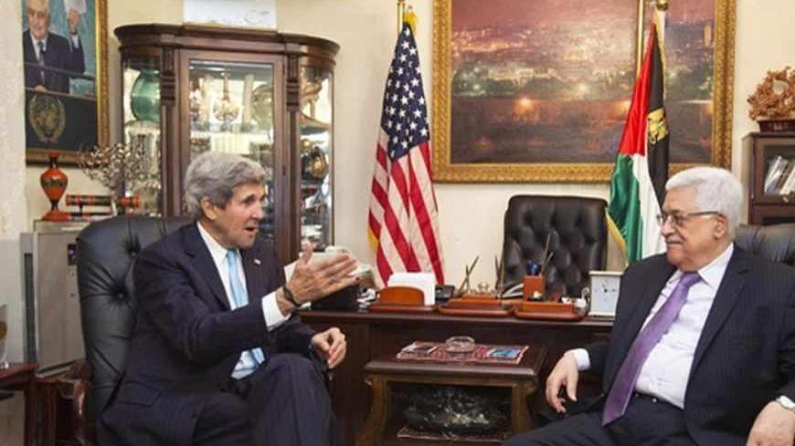 U.S. Secretary of State John Kerry (L) meets with Palestinian President Mahmoud Abbas in Amman, Jordan June 29, 2013. REUTERS/Jacquelyn Martin/Pool (JORDAN - Tags: POLITICS) - RTX115LD