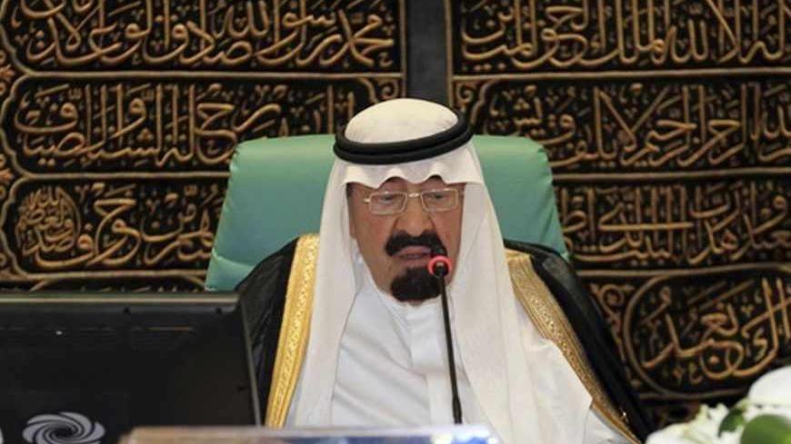 Saudi Arabia's King Abdullah speaks at the opening ceremony of the Organisation of Islamic Conference (OIC) summit in Mecca August 14, 2012. Leaders of Muslim countries are expected to suspend Syria's membership of the OIC at a summit in Mecca on Wednesday, despite the vocal objections of President Bashar al-Assad's main ally Iran. REUTERS/Hassan Ali (SAUDI ARABIA - Tags: POLITICS ROYALS) - RTR36UIG