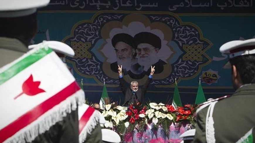 EDITORS' NOTE: Reuters and other foreign media are subject to Iranian restrictions on leaving the office to report, film or take pictures in Tehran.
Hamas Leader Ismail Haniyeh flashes the victory sign during a ceremony to mark the 33rd anniversary of the Islamic Revolution, in Tehran's Azadi square February 11, 2012. Iran's President Mahmoud Ahmadinejad said on the anniversary of the revolution that the Islamic Republic would soon announce "very important" REUTERS/Raheb Homavandi (IRAN - Tags: ANNIVERS