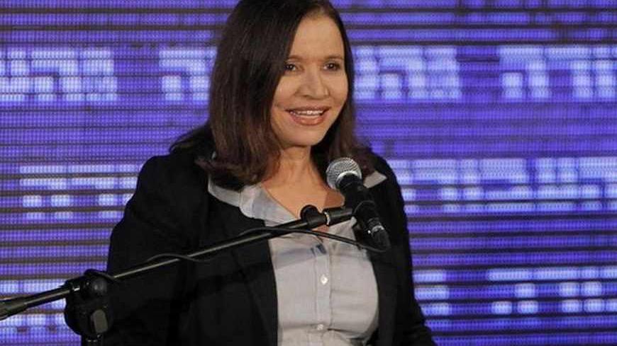 Labour party leader Shelly Yachimovich addresses supporters at her party's headquarters in Beit Berl, north of Tel Aviv January 23, 2013. Hawkish Prime Minister Benjamin Netanyahu emerged the bruised winner of Israel's election on Tuesday, claiming victory despite unexpected losses to resurgent centre-left challengers. REUTERS/Amir Cohen (ISRAEL - Tags: POLITICS ELECTIONS) - RTR3CTBJ