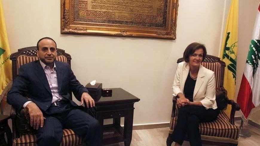 Angelina Eichhorst, head of EU delegation in Lebanon, meets with Ammar Moussawi, Hezbollah's international relations official in Beirut's southern suburbs July 25, 2013. Hezbollah leader Sayyed Hassan Nasrallah said on Wednesday the European Union had given Israel justification to attack Lebanon by blacklisting the armed wing of his group, and would bear responsibility for any Israeli military action. REUTERS/Sharif Karim (LEBANON - Tags: POLITICS) - RTX11YHU