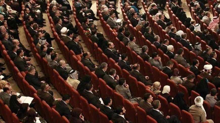 Members of the new Iraqi Parliament attend a session at the Parliament headquarters in Baghdad, November 11, 2010. Iraq's fractious politicians have agreed to return Shi'ite Nuri al-Maliki as prime minister, ending an eight-month deadlock that raised fears of renewed sectarian war, but leaving some Sunnis sceptical he can forge national unity. The pact on top government posts brings together Shi'ites, Sunnis and Kurds in a power-sharing arrangement similar to the last Iraqi government and could help prevent