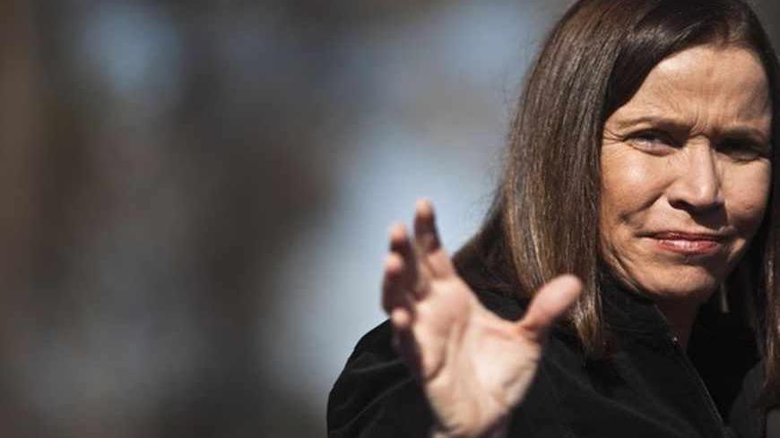 Labour party leader Shelly Yachimovich gestures during a ceremony for Tu Bishvat, the Jewish arbor day, in Ben-Shemen forest, near the Israeli town of Modiin between Tel Aviv and Jerusalem January 20, 2013. Opinion polls have shown Labour, which ruled Israel for decades but now holds only eight seats in parliament, bouncing back to second place behind Likud under new leader Yachimovich. REUTERS/ Nir Elias (ISRAEL - Tags: POLITICS ELECTIONS) - RTR3COPJ