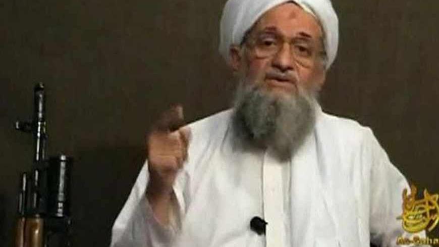 EDITOR'S NOTE: REUTERS IS UNABLE TO INDEPENDENTLY VERIFY CONTENT THE VIDEO FROM WHICH THIS STILL IMAGE WAS TAKEN. 
Al Qaeda's second-in-command Ayman al-Zawahri speaks from an unknown location, in this still image taken from video uploaded on a social media website June 8, 2011. Osama bin Laden's longtime lieutenant, Ayman al-Zawahri, said the United States faces rebellion throughout the Muslim world after killing the al Qaeda leader, according to a 28-minute YouTube recording posted on Wednesday. In what 