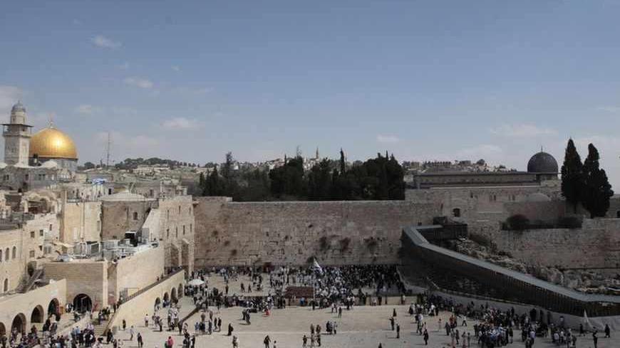 The Dome of the Rock (L), the Western Wall (C) and the Mughrabi Gate (R) entrance to the compound known to Muslims as al-Haram al-Sharif, and to Jews as Temple Mount, are seen in Jerusalem's Old City March 7, 2011. Israel has given preliminary approval for renovations at the contested holy site in East Jerusalem where rebuilding has triggered violence in the past, a city official said on Sunday. Municipal planners last week approved the project to repair an earthen ramp near the Mughrabi Gate connecting the