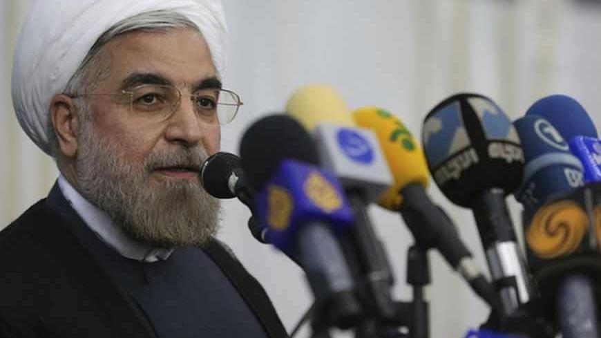 Iranian President-elect Hassan Rohani speaks to the media following a visit to the Khomeini mausoleum in Tehran June 16, 2013. Reuters/Fars News/Seyed Hassan Mousavi   (IRAN - Tags: POLITICS) ATTENTION EDITORS - THIS IMAGE WAS PROVIDED BY A THIRD PARTY. FOR EDITORIAL USE ONLY. NOT FOR SALE FOR MARKETING OR ADVERTISING CAMPAIGNS. THIS PICTURE IS DISTRIBUTED EXACTLY AS RECEIVED BY REUTERS, AS A SERVICE TO CLIENTS - RTX10Q4G