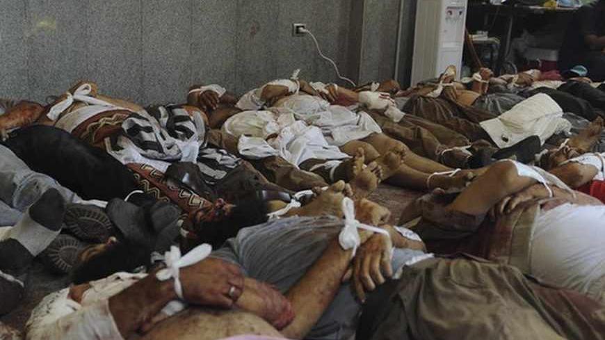ATTENTION EDITORS - VISUAL COVERAGE OF SCENES OF INJURY OR DEATH

Dead bodies of members of the Muslim Brotherhood and supporters of deposed Egyptian President Mohamed Mursi, lie in a room in a field hospital at the Rabaa Adawiya mosque, where they were camping, in Cairo August 14, 2013. Egyptian security forces killed at least 30 people on Wednesday when they cleared a camp of Cairo protesters who were demanding the reinstatement of Mursi, his Muslim Brotherhood movement said. REUTERS/Amr Abdallah Dalsh 