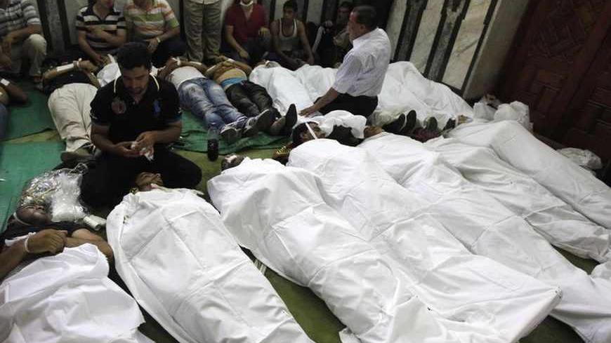 ATTENTION EDITORS - VISUAL COVERAGE OF SCENES OF INJURY OR DEATH
Bodies of protesters who support ousted Egyptian President Mohamed Mursi, killed during clashes, are seen inside a mosque in Ramses Square in Cairo, August 16, 2013. Protests by supporters of ousted Islamist President Mohamed Mursi turned violent across Egypt on Friday, with witnesses reporting four dead in central Cairo and at least 12 killed in northern cities as the Muslim Brotherhood staged a "Day of Rage". REUTERS/Mohamed Abd El Ghany (E