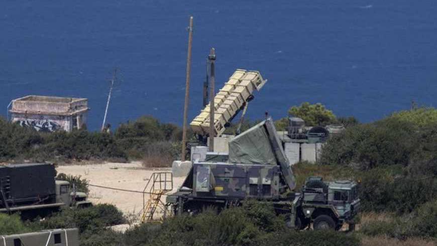 A Patriot anti-missile battery is deployed in the northern city of Haifa August 29, 2013. Israel ordered a small-scale mobilisation of reservists on Wednesday, and strengthened its missile defences as precautions against possible Syrian attack should Western powers carry out threatened strikes on Syria. REUTERS/Baz Ratner (ISRAEL - Tags: CIVIL UNREST MILITARY POLITICS) - RTX12ZZO
