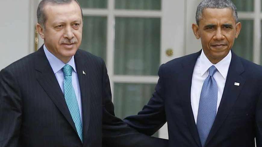 U.S. President Barack Obama (R) and Turkish Prime Minister Recep Tayyip Erdogan arrive for a joint news conference in the White House Rose Garden in Washington, May 16, 2013. REUTERS/Jason Reed (UNITED STATES - Tags: POLITICS) - RTXZPAE