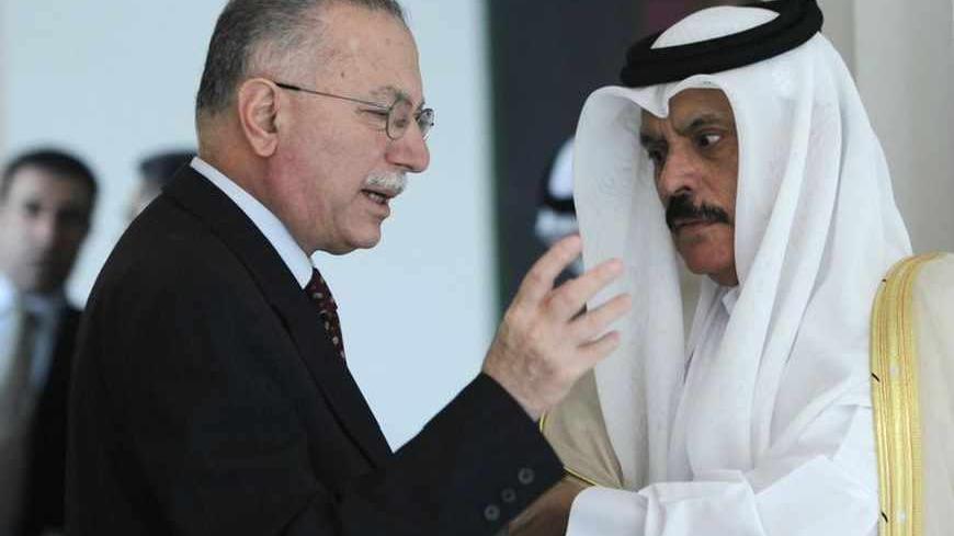 Ekmeleddin Ihsanoglu, secretary-general of the Organisation of the Islamic Conference (L) speaks with Gulf Cooperation Council (GCC) Secretary-General Abdul-Rahman al-Attiyah before a news conference in Riyadh March 28, 2011. Qatar's support for the rebel Libyan National Council shows the group is the only legitimate representative of the Libyan people, the secretary general of the political and economic bloc of Gulf countries said on Monday. REUTERS/Fahad Shadeed (SAUDI ARABIA - Tags: POLITICS) - RTR2K