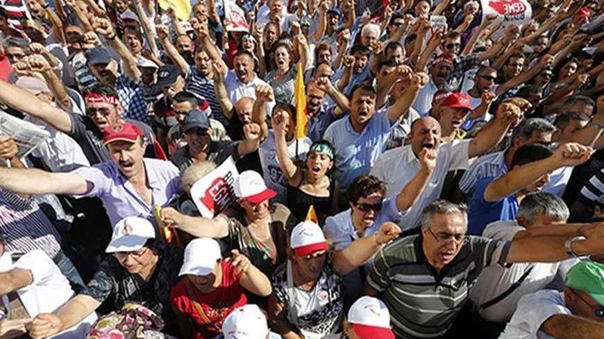 Anti-government Alevi protesters shout slogans during a demonstration in Istanbul June 23, 2013. The European Union is on the verge of scrapping a new round of membership talks with Turkey, a move that would further undermine Ankara's already slim hopes of joining the bloc and damage its relations with Brussels. Germany, the EU's biggest economic power, is blocking efforts to revive Turkey's EU membership bid, partly because of its handling of anti-government protests that have swept the country in the last