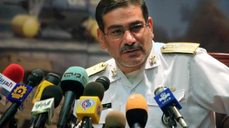 Iranian outgoing Defence Minister Ali Shamkhani speaks with journalists during a news conference at the Defence Ministry in Tehran August 9, 2005. Iran, a signatory of the nuclear Non-Proliferation Treaty (NPT), would drop all its international nuclear pledges if its atomic facilities were attacked, the outgoing Defence Minister said on Tuesday. REUTERS/Morteza Nikoubazl  MN/KI - RTRJZFP