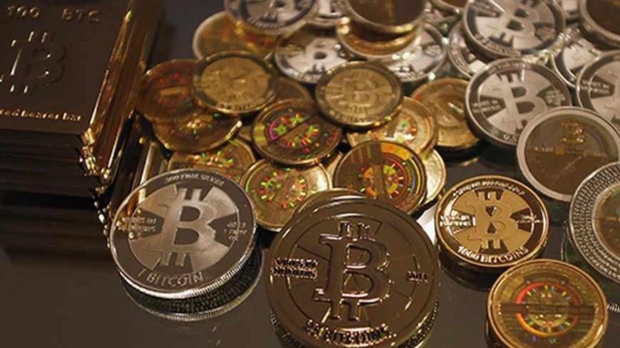 Some of Bitcoin enthusiast Mike Caldwell's coins are pictured at his office in Sandy, Utah, September 17, 2013.Caldwell produces physical coins Bitcoins, which have been around since 2008, and have become a form of electronic money that can be exchanged without using traditional banking or money transfer systems. Bitcoins, touted by some experts as the future of money, gained in prominence during Europe's financial crisis as more people questioned the safety of holding their cash in the bank. REUTERS/Jim Ur