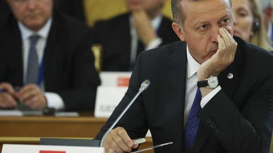 Turkish Prime Minister Tayyip Erdogan attends the first working session of the G20 Summit in Constantine Palace in Strelna near St. Petersburg, September 5, 2013.            REUTERS/Sergei Karpukhin (RUSSIA  - Tags: POLITICS)   - RTX138DI