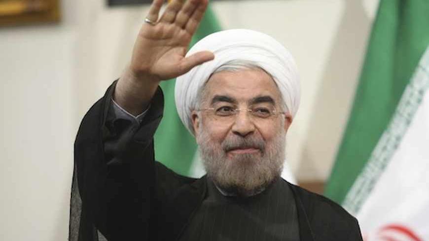 Iranian President-elect Hassan Rohani gestures to the media during a news conference in Tehran June 17, 2013. REUTERS/Fars News/Majid Hagdost  (IRAN - Tags: POLITICS PROFILE) ATTENTION EDITORS - THIS IMAGE WAS PROVIDED BY A THIRD PARTY. FOR  EDITORIAL USE ONLY. NOT FOR SALE FOR MARKETING OR ADVERTISING CAMPAIGNS. THIS PICTURE IS DISTRIBUTED EXACTLY AS RECEIVED BY REUTERS, AS A SERVICE TO CLIENTS - RTX10QWD
