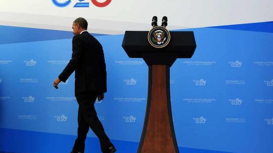 U.S. President Barack Obama departs a news conference at the G20 Summit in St. Petersburg September 6, 2013. Obama said on Friday that most leaders of the G20 countries agree that Syrian President Bashar al-Assad is responsible for using poison gas against civilians as the U.S. leader tried to rally support at home and abroad for a military strike. 
REUTERS/Kevin Lamarque  (RUSSIA - Tags: POLITICS CONFLICT MILITARY) - RTX139S8