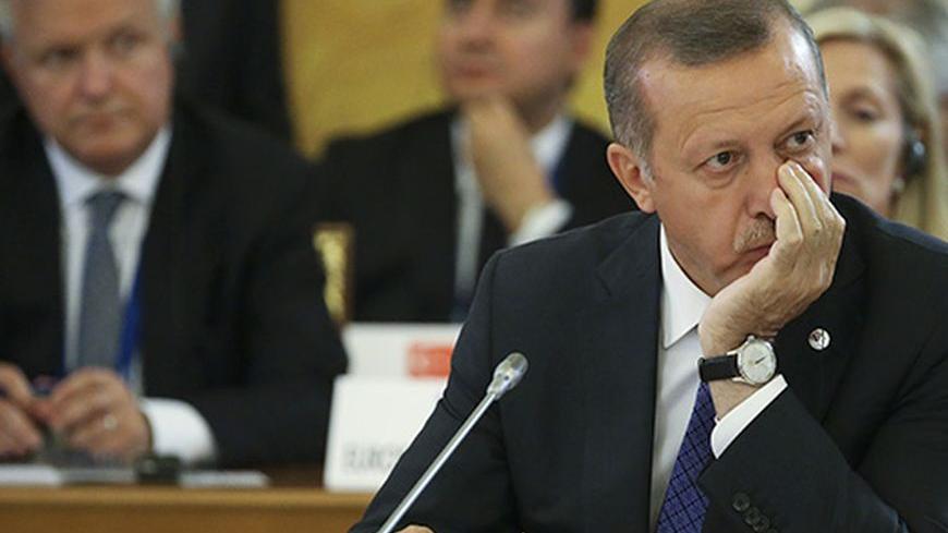 Turkish Prime Minister Tayyip Erdogan attends the first working session of the G20 Summit in Constantine Palace in Strelna near St. Petersburg, September 5, 2013.            REUTERS/Sergei Karpukhin (RUSSIA  - Tags: POLITICS)   - RTX138DI