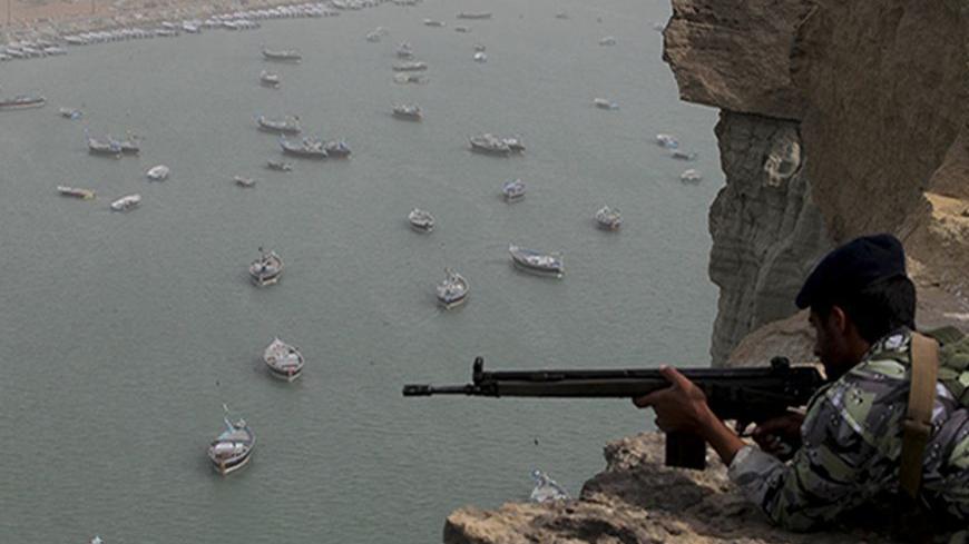 Iranian military personnel participate in the Velayat-90 war game in unknown location near the Strait of Hormuz in southern Iran December 30, 2011. REUTERS/Fars News/Hamed Jafarnejad (IRAN - Tags: POLITICS MILITARY) FOR EDITORIAL USE ONLY. NOT FOR SALE FOR MARKETING OR ADVERTISING CAMPAIGNS. THIS IMAGE HAS BEEN SUPPLIED BY A THIRD PARTY. IT IS DISTRIBUTED, EXACTLY AS RECEIVED BY REUTERS, AS A SERVICE TO CLIENTS - RTR2VQX9