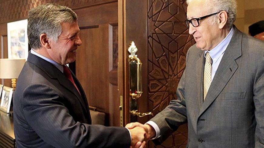 Jordan's King Abdullah (L) shakes hands with U.N.-Arab League envoy for Syria Lakhdar Brahimi at the Royal Palace in Amman October 23, 2013. REUTERS/Jordanian Royal Palace/Yousef Allan/Handout via Reuters (JORDAN - Tags: POLITICS ROYALS) ATTENTION EDITORS - THIS IMAGE HAS BEEN SUPPLIED BY A THIRD PARTY. IT IS DISTRIBUTED, EXACTLY AS RECEIVED BY REUTERS, AS A SERVICE TO CLIENTS. FOR EDITORIAL USE ONLY. NOT FOR SALE FOR MARKETING OR ADVERTISING CAMPAIGNS - RTX14L3R