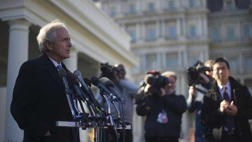 US Senator Bob Corker, R-Tennessee, talks with reporters at the White House after a meeting on Iran with President Obama in Washington, DC, November 19, 2013. US President Barack Obama met with key Senate committee chairpersons and ranking members about Iran, urging them to hold off on more sanctions against the regime in Tehran over its nuclear program.    AFP PHOTO / Jim WATSON        (Photo credit should read JIM WATSON/AFP/Getty Images)