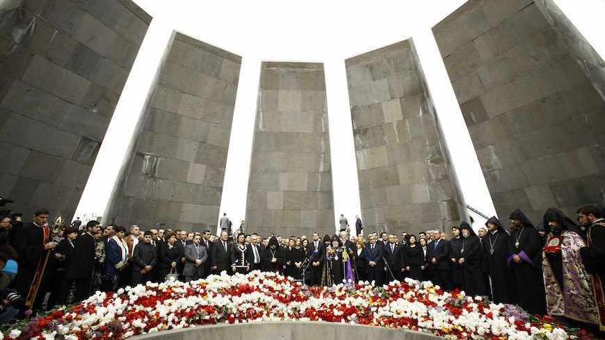 People take part in a commemoration ceremony to mark the anniversary of the 1915 mass killings of Armenians in the Ottoman Empire at the Armenian Genocide Memorial in Yerevan, April 24, 2011. Armenia, backed by many historians and world parliaments, says some 1.5 million Armenians died during the upheavals that accompanied World War I and labels the events as genocide. On the other hand, Ankara rejects the term genocide and says large numbers of both Christian Armenians and Muslim Turks were killed.   REUTE