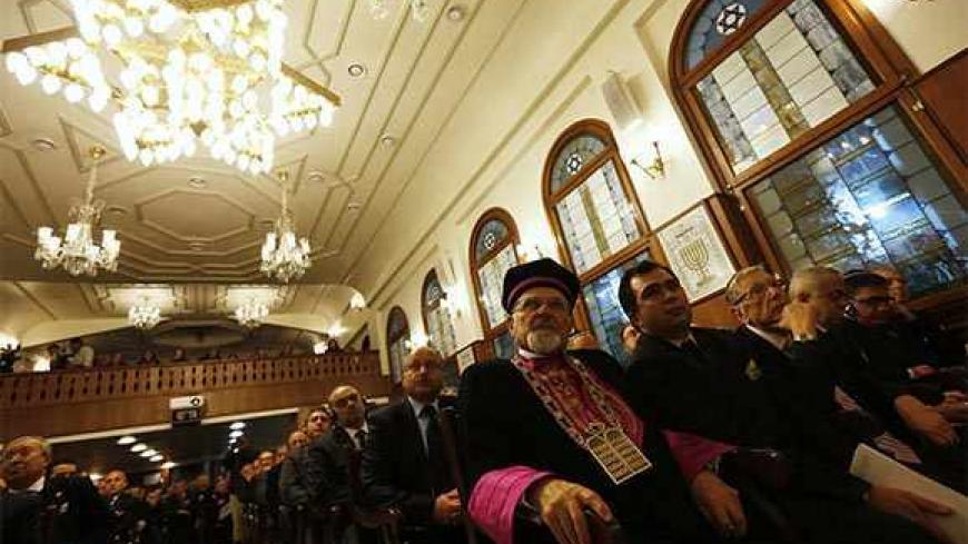 Members of Turkey's Jewish community gather at Etz Ahayim Synagogue to commemorate International Holocaust Remembrance Day in Istanbul January 27, 2013. The International Day of Commemoration, which was designated by the United Nations General Assembly to honour Holocaust victims, occurs annually on January 27. REUTERS/Murad Sezer (TURKEY - Tags: POLITICS RELIGION ANNIVERSARY) - RTR3D1V0
