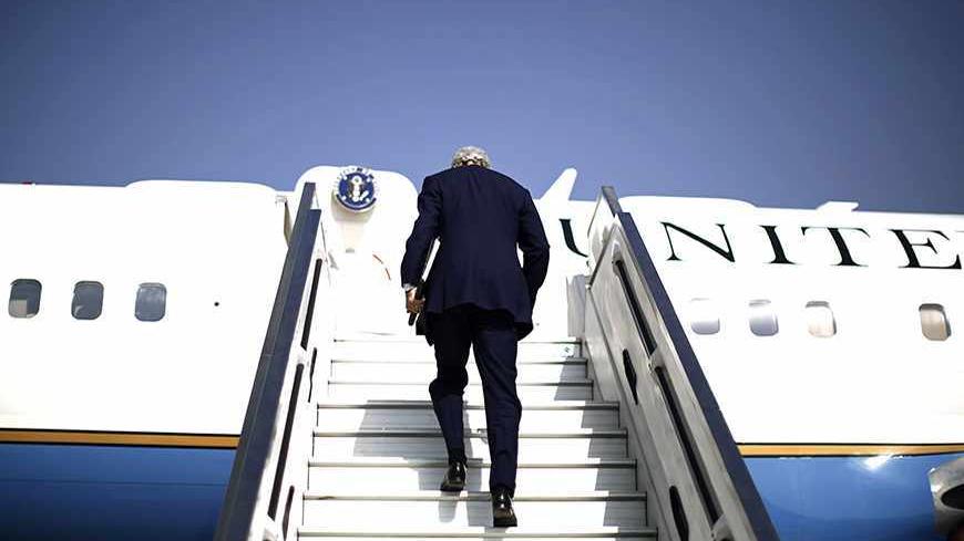 U.S. Secretary of State John Kerry steps aboard his aircraft en route to Geneva, after holding private talks with Israeli Prime Minister Benjamin Netanyahu in Tel Aviv November 8, 2013. REUTERS/Jason Reed (ISRAEL - Tags: POLITICS TPX IMAGES OF THE DAY) - RTX1553K