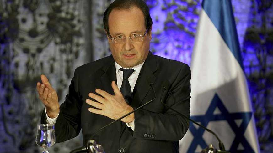 France's President Francois Hollande delivers a statement to the media at the residence of Israel's President Shimon Peres in Jerusalem November 17, 2013. Hollande assured Israel on Sunday that France would continue to oppose an easing of economic sanctions against Iran until it was convinced Tehran had ended a pursuit of nuclear weapons. REUTERS/Abir Sultan/Pool (JERUSALEM - Tags: POLITICS) - RTX15H77