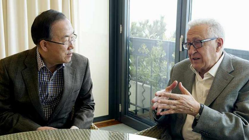 United Nations chief Ban Ki-moon (L) and Syria mediator Lakhdar Brahimi speak during a meeting in Mont Pelerin March 2, 2013. Ban and Syria mediator Brahimi expressed frustration on Saturday at the failure to end Syria's conflict and said the United Nations was ready to facilitate peace talks. Ban and Brahimi met in Mt. Pelerin, Switzerland, to discuss the two-year-old war that has killed more than 70,000 people. REUTERS/U.N. Photo/Evan Schneider/Handout (SWITZERLAND - Tags: POLITICS MILITARY) ATTENTION EDI