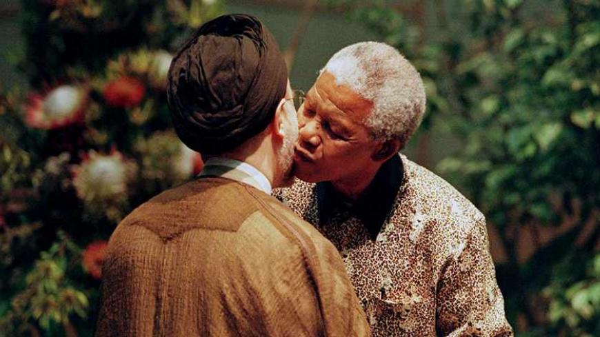 President Nelson Mandela embraces President of Iran Mohammad Khatami September 2, during the 12th summit of the Non-Aligned Movement in Durban. Sixty heads of State attend the meeting which runs until September 3.

JN/WS - RTRGW4H