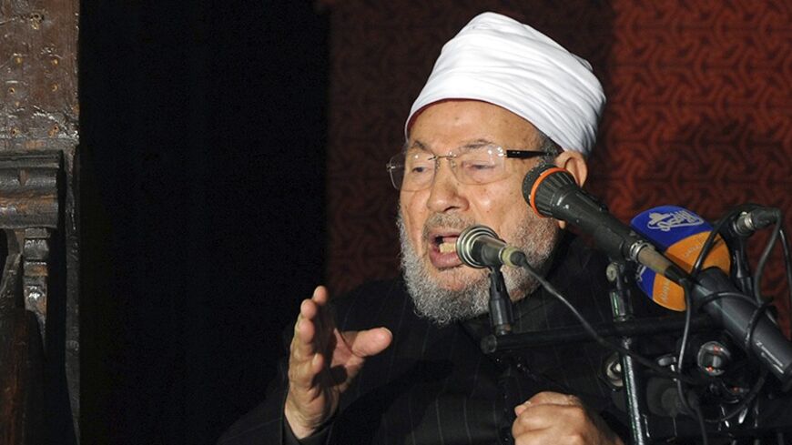 Egyptian Cleric Sheikh Yusuf al-Qaradawi, chairman of the International Union of Muslim Scholars, gives a speech during Friday prayers, before a protest against Syrian President Bashar al-Assad, at Al Azhar mosque in old Cairo December 28, 2012. REUTERS/Amr Abdallah Dalsh  (EGYPT - Tags: POLITICS CIVIL UNREST RELIGION) - RTR3BY1C