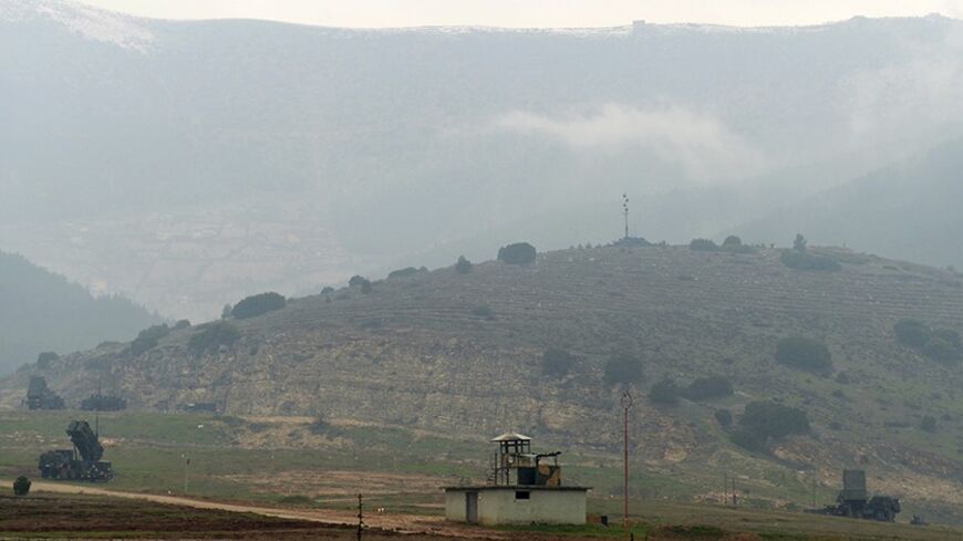 Patriot missile batteries are pictured at their positions near the city of Kahramanmaras, February 23, 2013. Germany's defence minister inspected Patriot missile batteries close to the Syria-Turkey border on Saturday and said they delivered a "clear warning" to Damascus that NATO would not tolerate missiles being fired into Turkey. Thomas de Maiziere and his Dutch counterpart Jeanine Hennis-Plasschaert travelled to the Turkish cities of Adana and Kahramanmaras to inspect the batteries provided by their coun